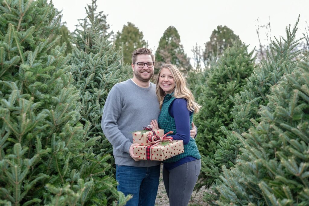 Cute young couple at the Christmas tree farm